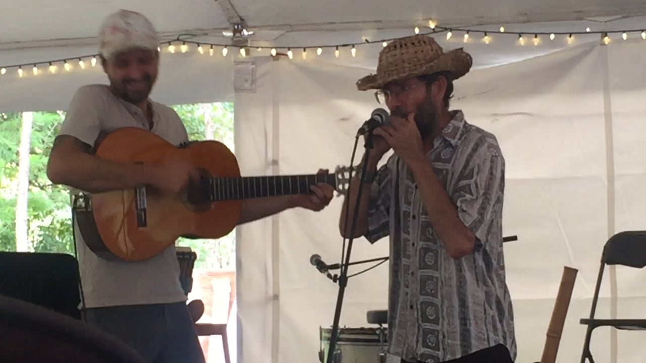 Naturalist, storyteller, and herbalist Doug Elliot singing in honor of Jim Duke at the dedication of the Center for Medicinal Plant Conservation at the United Plant Savers sanctuary.